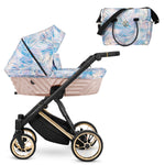 Carrozzina Kunert Ivento 3in1 Pastel Grass – navicella rosa pesca, telo foglie azzurro iridescente, ruote oro e borsa inclusa