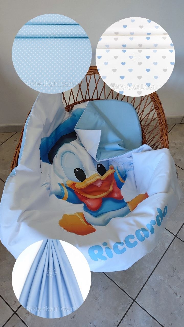Corredino culla vimini neonato azzurro cielo – Baby Paperino su bianco, nome stampato, tinta unita e pois bianchi