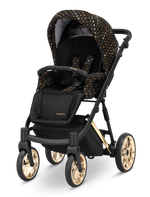 Passeggino Ivento Kunert Black Style seduta nera fantasia oro con ruote dorate vista frontale