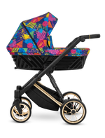 Passeggino Ivento Kunert Colors Impression navicella multicolore pop art ruote dorate vista laterale