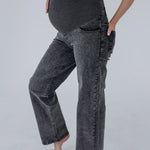 Jeans gravidanza in denim grigio scuro con elastan, vita alta in maglia che segue la crescita del pancione