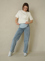 Jeans premaman denim chiaro dritto con spacco, fascia vita alta
