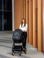 Passeggino lusso Kunert nero fantasia ruote dorate con navicella mamma outdoor architettura moderna