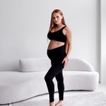 Leggings premaman neri in cotone a vita alta sul pancione, vista intera