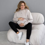Leggings premaman invernali imbottiti neri indossati con felpa, look comodo in gravidanza