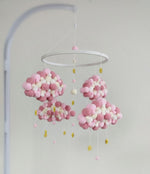 Giostrина musicale culla nuvole pon pon feltro rosa antico rosa cipria e bianco con stelline glitter oro