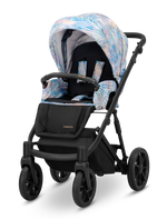Passeggino Kunert Ivento Pastel Grass con telaio e ruote nero opaco – telo azzurro rosa iridescente fantasia foglie