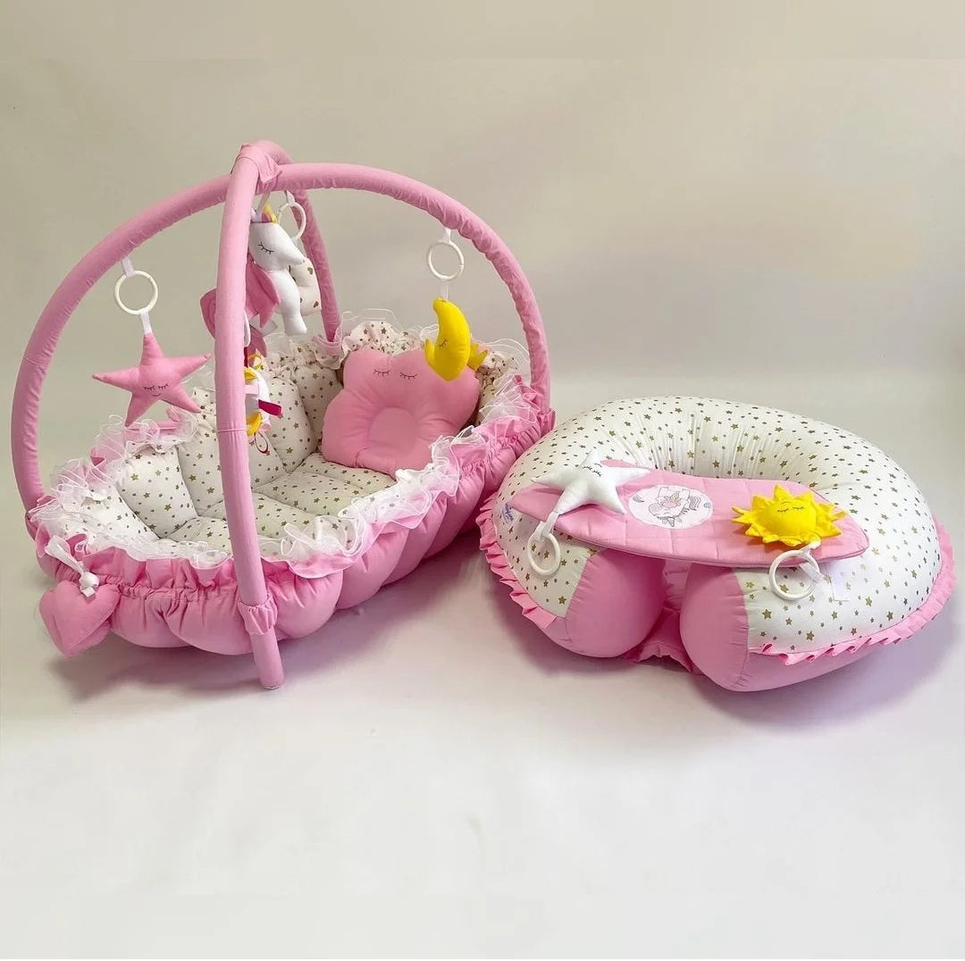 Riduttore nido neonato 3 in 1 rosa, palestrina 5 giochi sonori, unicorno stelle dorate e cuscino allattamento